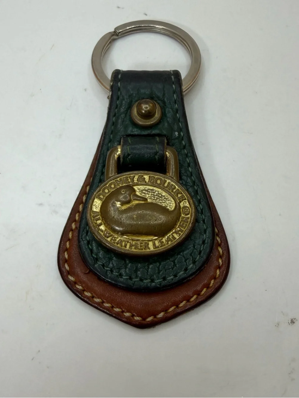 Dooney & Bourke Green and Brown Leather Key Fob with Brass Duck Medallion